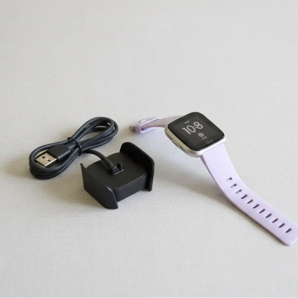 Fitbit versa Smartwatch with Lavender Strap